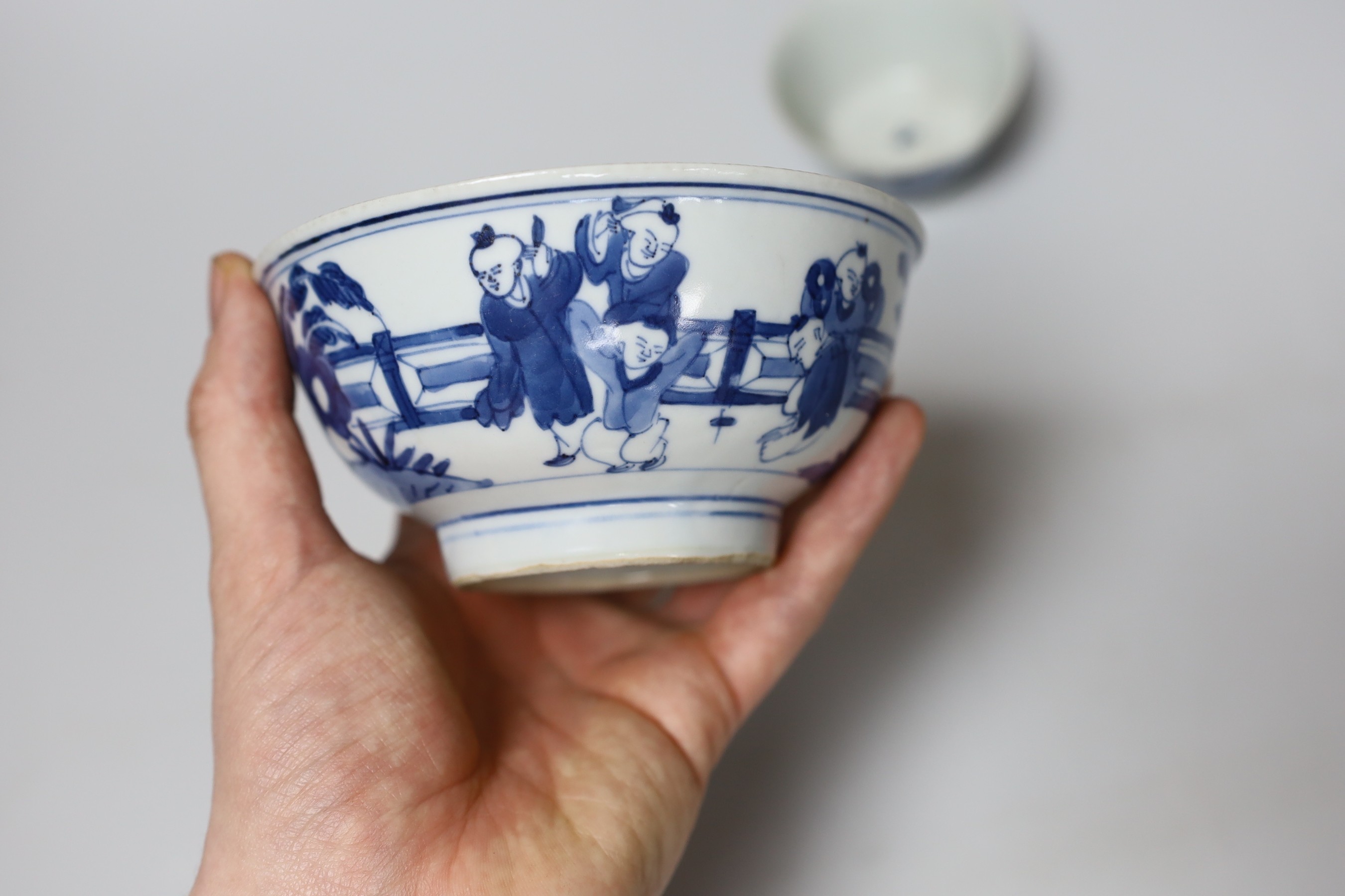 A Chinese Kangxi blue and white tea bowl and saucer, and a blue and white bowl, largest 13cm diameter